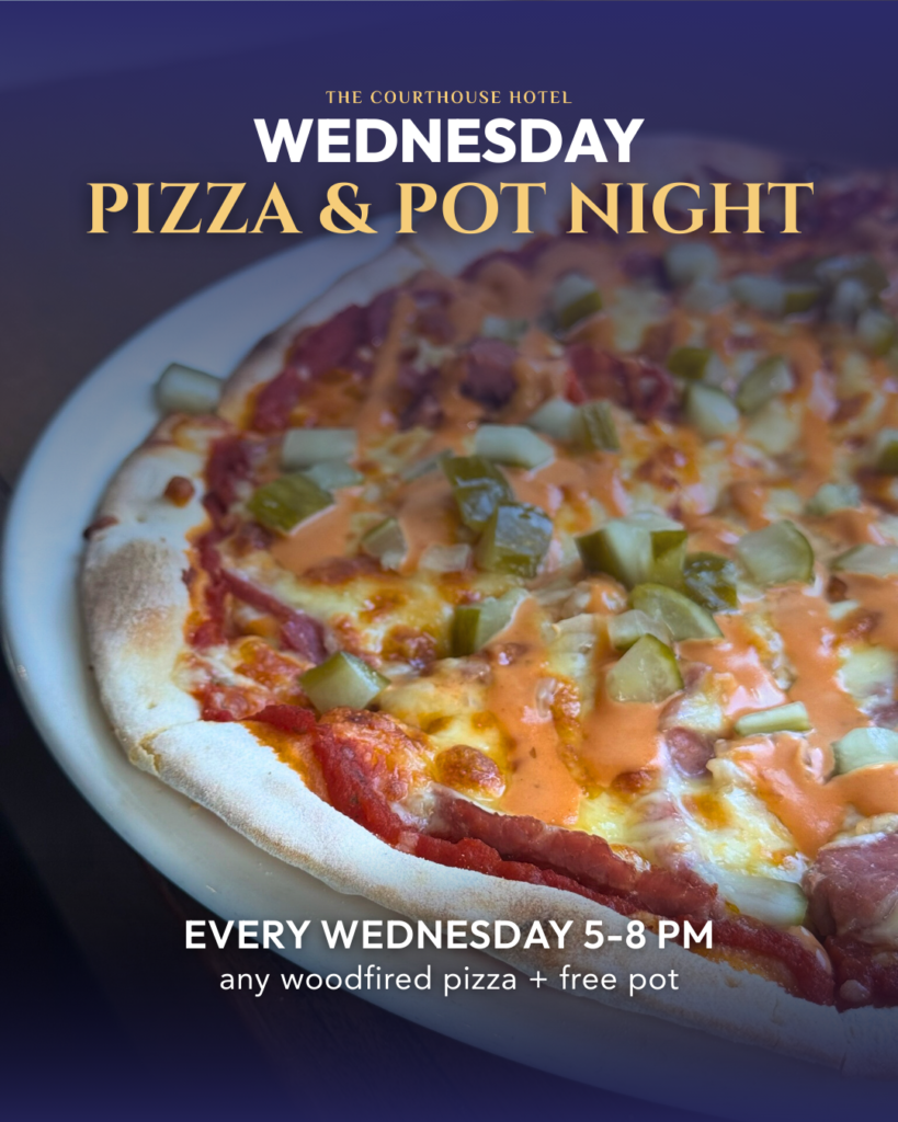 Wood-fired pizza and a pot of beer on a table for Wednesday Pizza & Pot Night at The Courthouse Hotel Smythesdale.